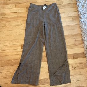 Forever 21 wide leg checkered brown tan pants with slit at bottom.